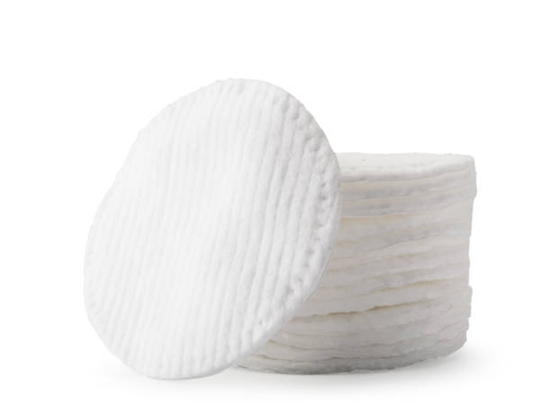 istock Cotton pads close-up on a white. Isolated. 1157566971