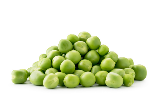 Heap of ripe green peas close up on a white background. Isolated