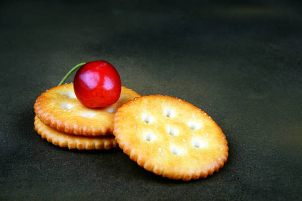 Ripe pricots, dry fruits in sugar, red currant and crispy crackers with seeds