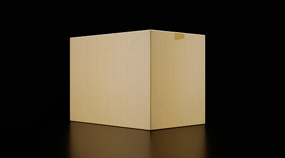 Cardboard box on black background. Front view. Horizontal composition with copy space.