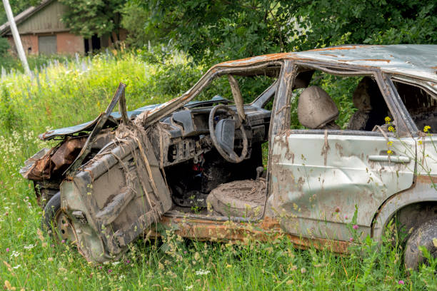 istock the body of a crashed car drowned in mud 1157572105