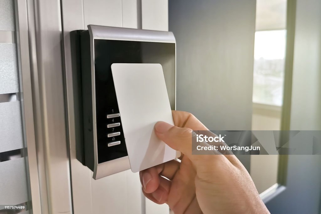 Hand using Key card;access control concept Accessibility Stock Photo
