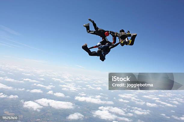 Four Skydivers In Freefall Foto de stock y más banco de imágenes de Orden - Orden, Paracaidismo, Caída libre - Paracaidismo