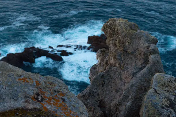 Close-up of a rock in the rough sea of Galicia, Spain