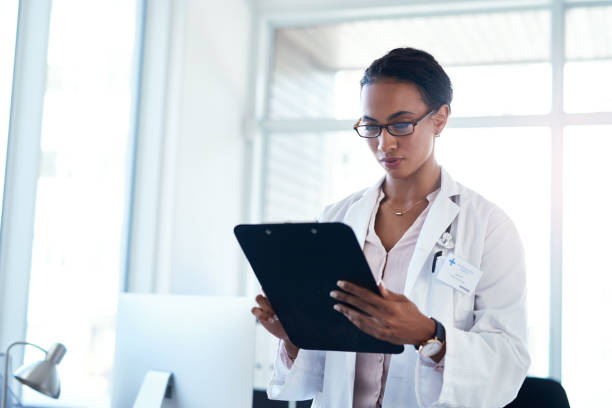 istock Getting a detailed look at her patient's symptoms 1157580228