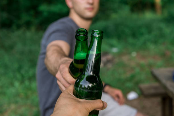 istock Celebrating a day off, having a break, a day in nature drinking beer 1157580526