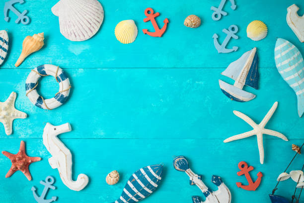 istock Summer background with nautical and marine decorations on wooden table. 1157581402