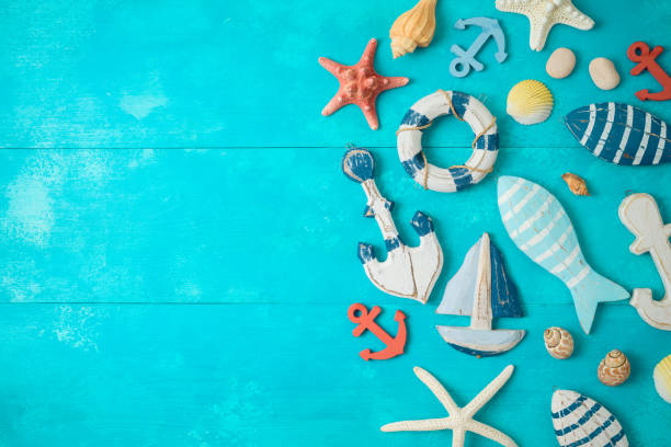 istock Summer background with nautical and marine decorations on wooden table. 1157581409