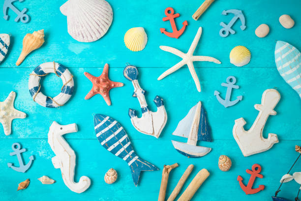 Summer background with nautical and marine decorations on wooden table.