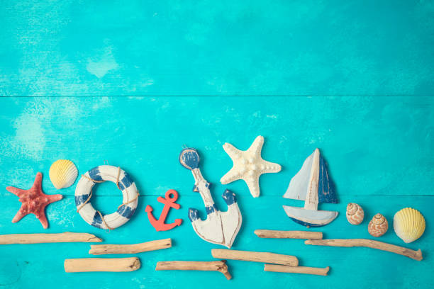 istock Summer background with nautical and marine decorations on wooden table. 1157581431