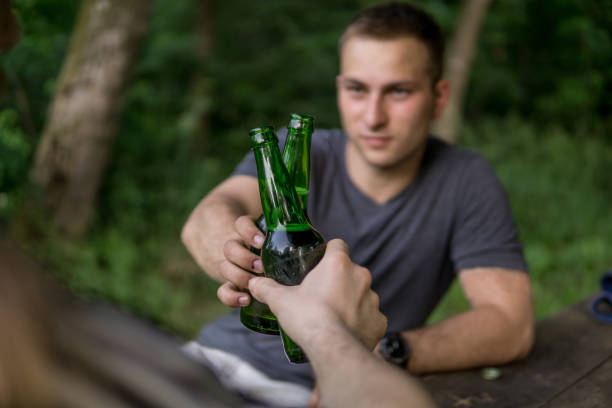istock Celebrating a day off, having a break, a day in nature drinking beer 1157582837