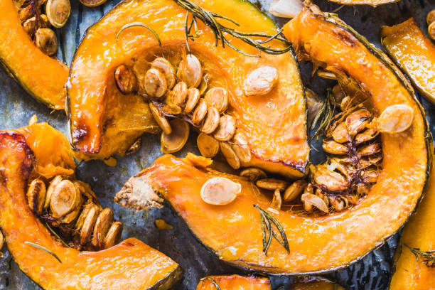 istock Pumpkin.Slices of roasted pumpkin. 1157583114