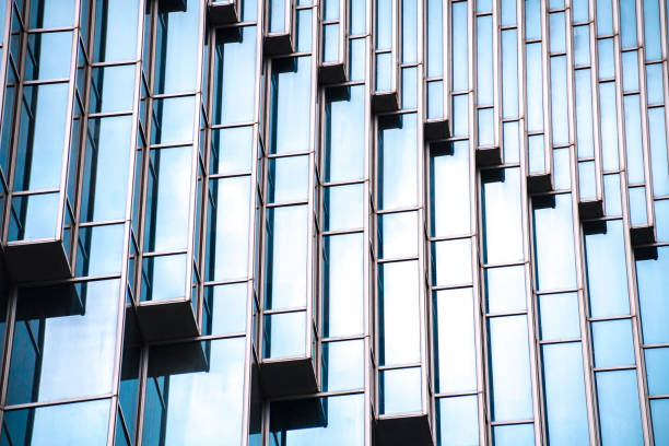 istock Architecture details Modern Building Glass facade Business background 1157584452