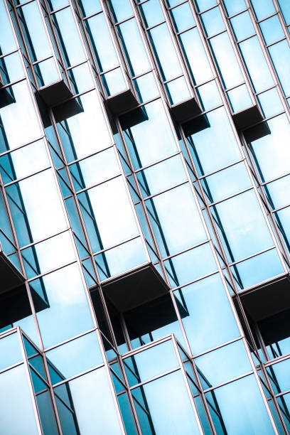 istock Architecture details Modern Building Glass facade Business background 1157584789
