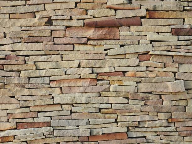 istock Old wall made of natural stone 1157587984