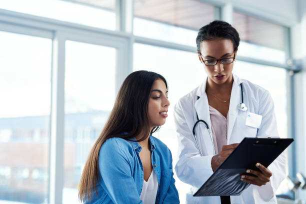 istock Making thorough diagnoses for the good of her patient's 1157591994