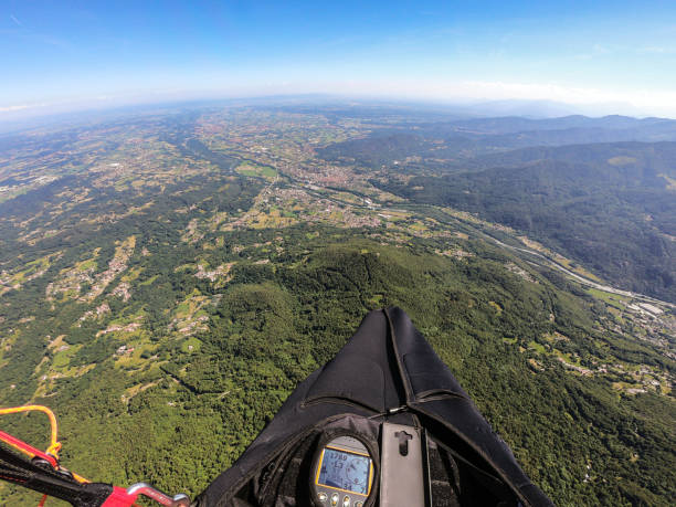 istock Paragliding over the Alps in a beautiful spring day, Italy 1157597405