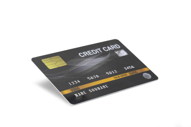 carte de crédit noire d'isolement sur le fond blanc avec le chemin de coupure - gold paying internet credit card photos et images de collection