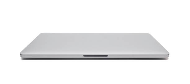 istock Closed laptop isolated on white background with clipping path 1157599340