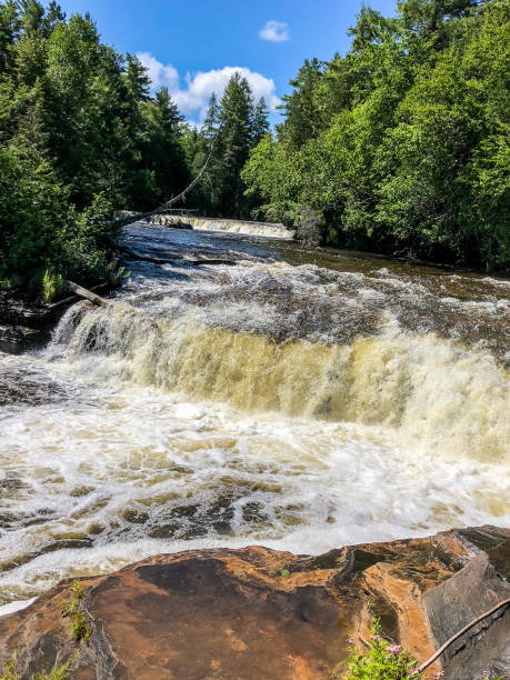 istock Scenic view of gorgeous waterfalls 1157599640