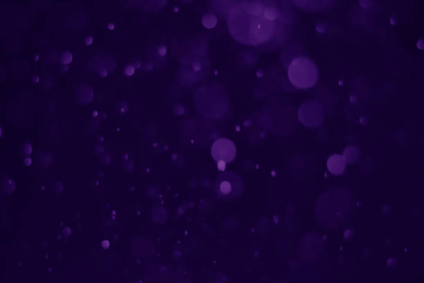 istock Bokeh purple proton background abstract 1157602626