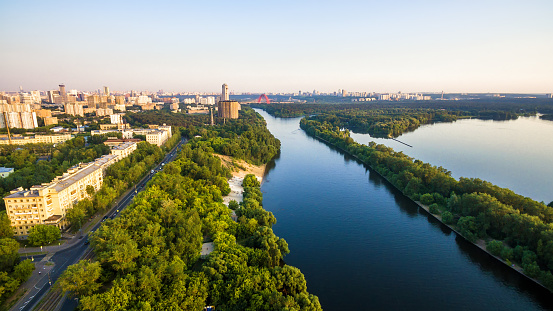 Panoramic aerial view of Moscow, Russia. Scenery of Moskva River with bays in Moscow northwest. Beautiful landscape of Moscow in summer evening. Scenic skyline of Moscow district Schukino.