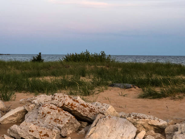 istock View of beautiful lake with rocks in front 1157608207