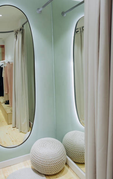 istock fitting room mirrors beige curtains clothing store 1157608450