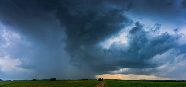 istock Image of dark Storm clouds in the field 1157612996