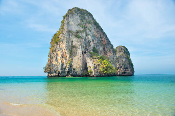 istock Tropical landscape with sea and rock island 1157613751