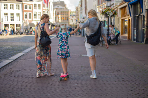 Beautiful Lesbian Tourist Couple in Gouda Beautiful Lesbian Tourists in Gouda gouda south holland stock pictures, royalty-free photos & images