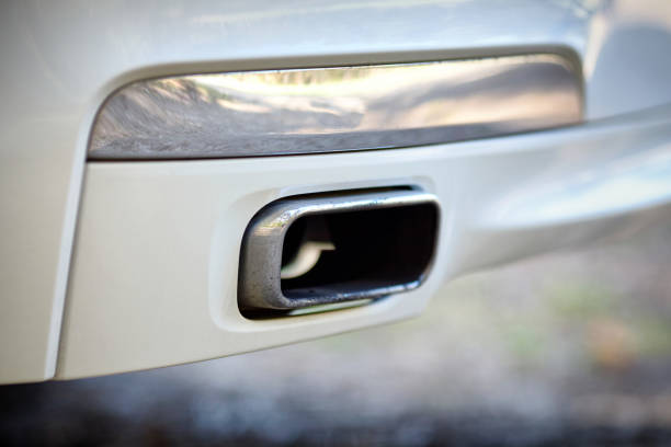 istock Low angle view of the exhaust pipe of a car with selective focus on tailpipe 1157620642