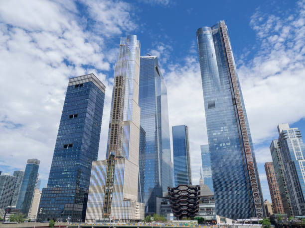 New York, NY, USA. View of skyscrapers at the Hudson Yards. The new neighborhood on the West Side of Midtown Manhattan New York, NY, USA. View of skyscrapers at the Hudson Yards. The new neighborhood on the West Side of Midtown Manhattan midtown manhattan photos stock pictures, royalty-free photos & images