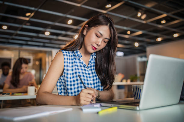 istock Woman in modern office 1157626279