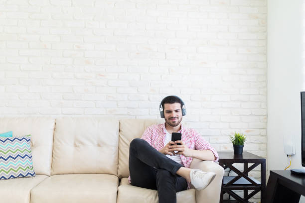 istock Video Blogger Using Smartphone At Home 1157628914
