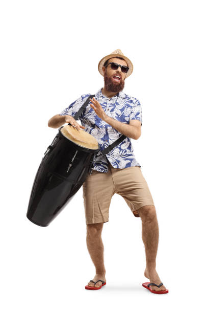 brodaty młody człowiek gra na perkusji conga - rythm zdjęcia i obrazy z banku zdjęć