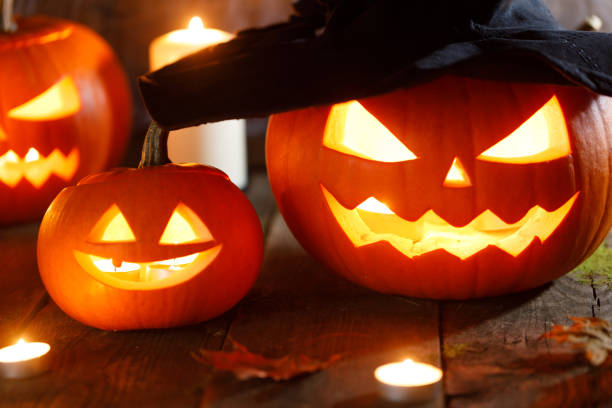 istock Halloween pumpkin with witches hat 1157630012