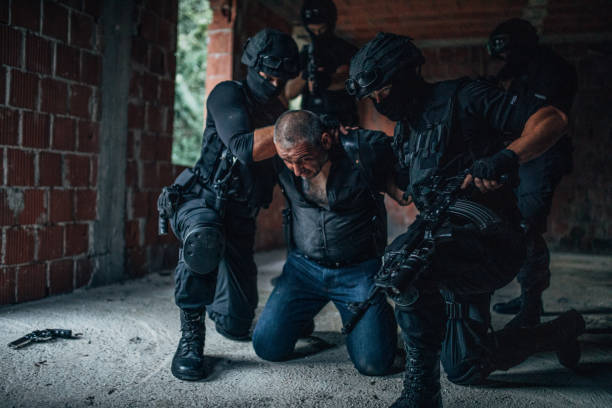 istock Police Arresting Gangster 1157632894