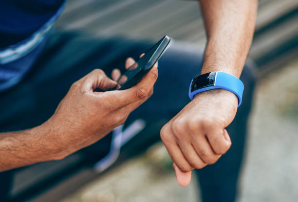 istock Sportsman checking his smart watch 1157633028