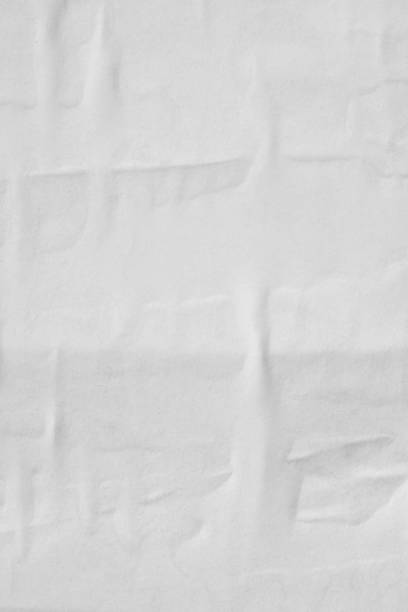 istock Blank old ripped torn paper crumpled creased posters grunge textures backdrop backgrounds stock photo 1157633040