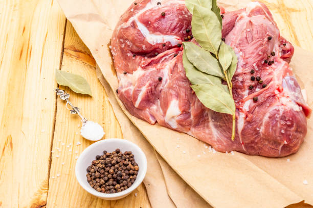 istock Raw pork shoulder with spices 1157633051