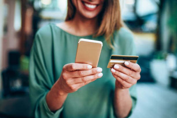 istock Young woman shopping online 1157633055