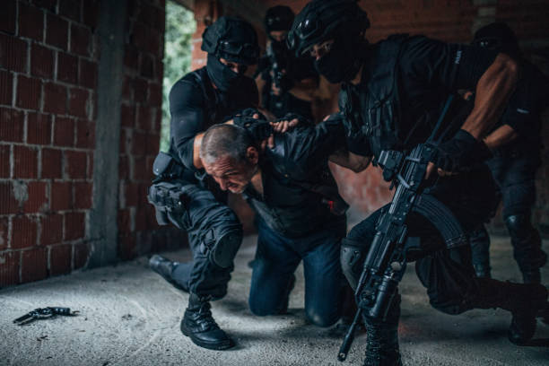 istock Police Arresting Gangster 1157633220