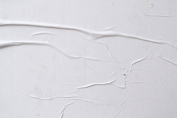 istock White creased poster texture. Abstract background. 1157635193