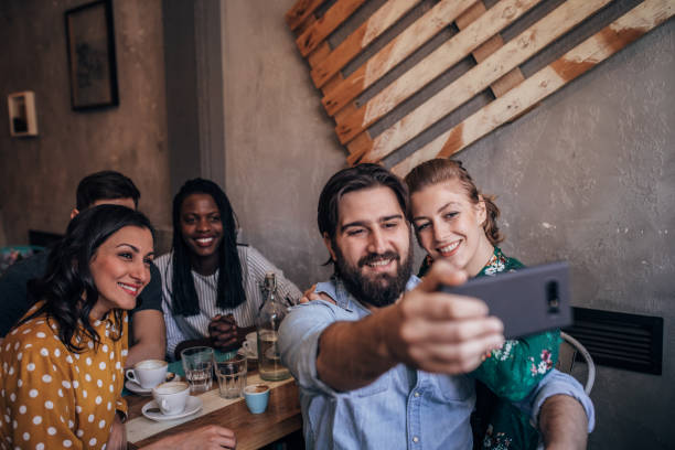 istock Friends making selfie at coffee shop 1157640113