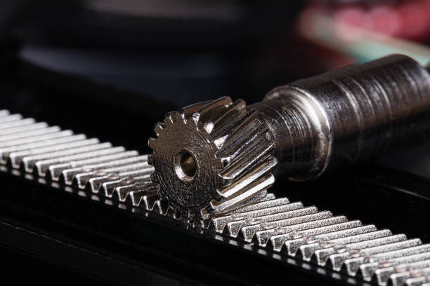 Linear Rack gear with a pinion gear.  Mechanism for linear precision mechanical motion.  Often part of a step motor positioning system or a macro positioning system utilizing step motors.