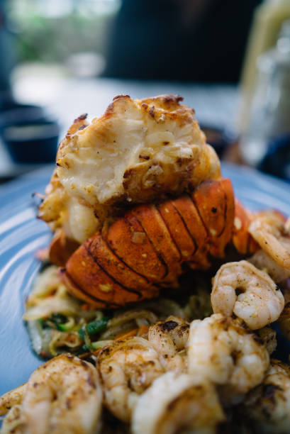 istock Juicy grilled lobster and shrimp on a plate 1157665543