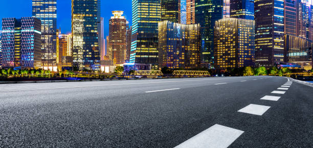 istock Shanghai modern commercial buildings and empty asphalt road 1157675093