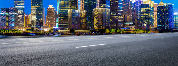 istock Shanghai modern commercial buildings and empty asphalt road 1157675274