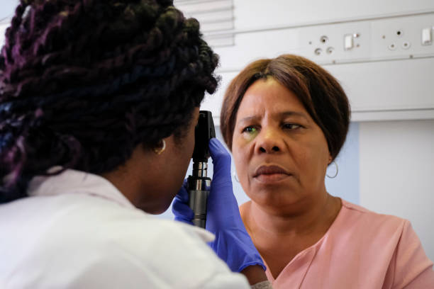 istock Close up examination of the patients eye 1157681069